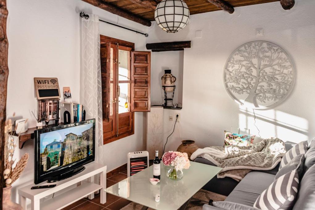 شقة La Casita Del Arbol Blanco Bubión المظهر الخارجي الصورة